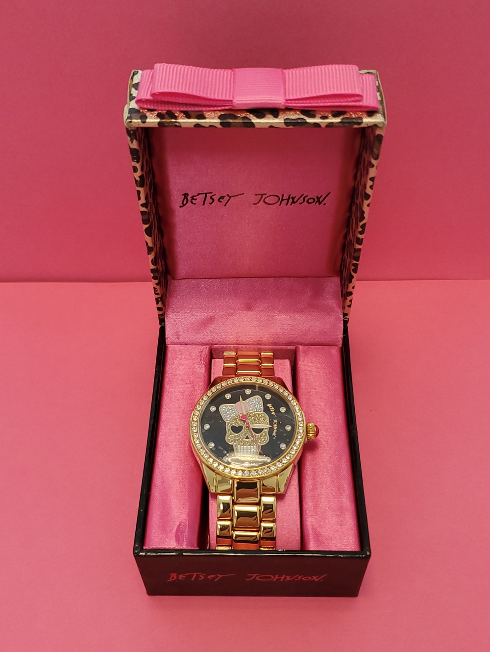 Betsey Johnson Gold-Tone Watch with Black Dial and Pink Bow Accent